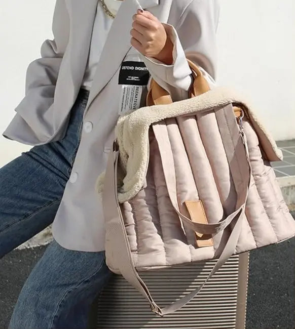 Lightweight and spacious pet handbag, ideal for small dogs and cats.