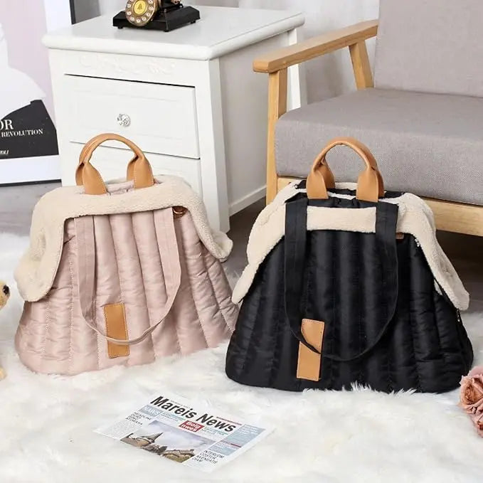 Lightweight and spacious pet handbag, ideal for small dogs and cats.