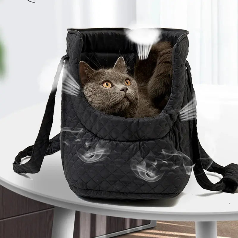 Stylish quilted cotton pet handbag for small dogs and cats, available in chic colors.