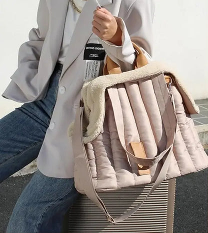 Lightweight and spacious pet handbag, ideal for small dogs and cats.
