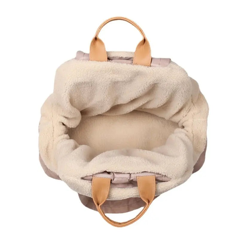 Stylish and durable dog and cat handbag carrier for cold weather outings, with soft plush interior