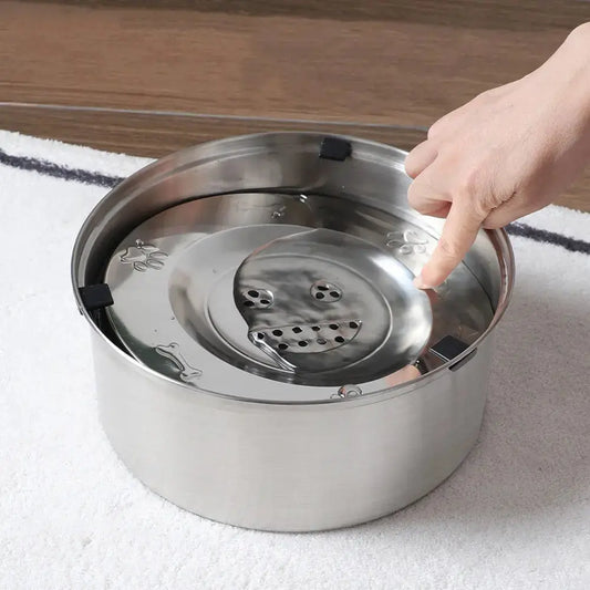 Anti-splash water bowl for dogs available in dual sizes with stainless steel construction.